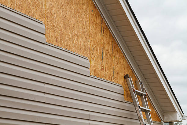 Professional Siding Installation technician working in Churchville, PA
